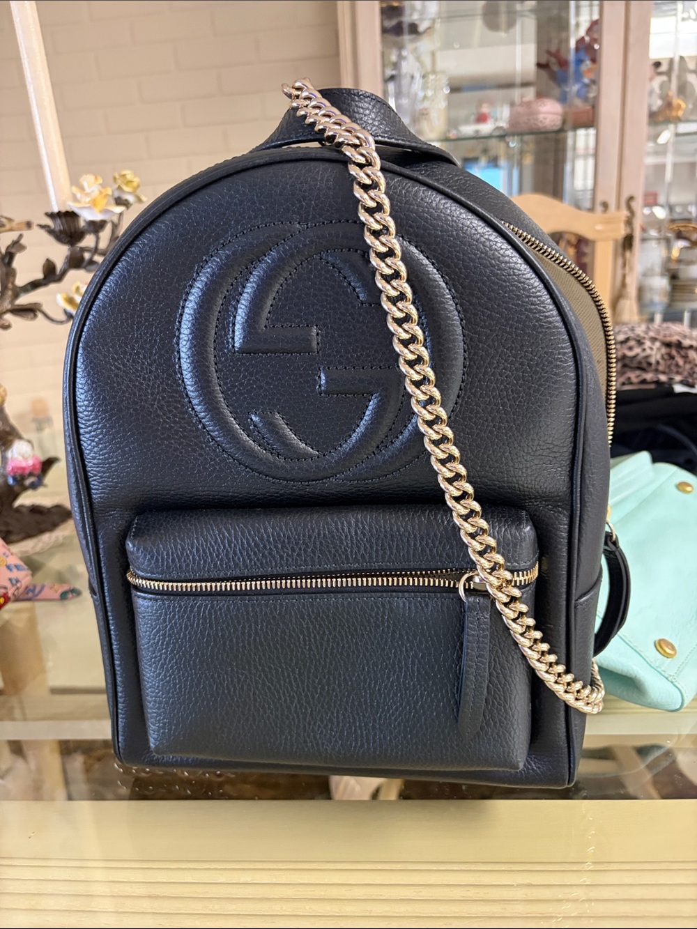 Gucci Black Pebbled Leather Mini Backpack with Gold Chain Accent